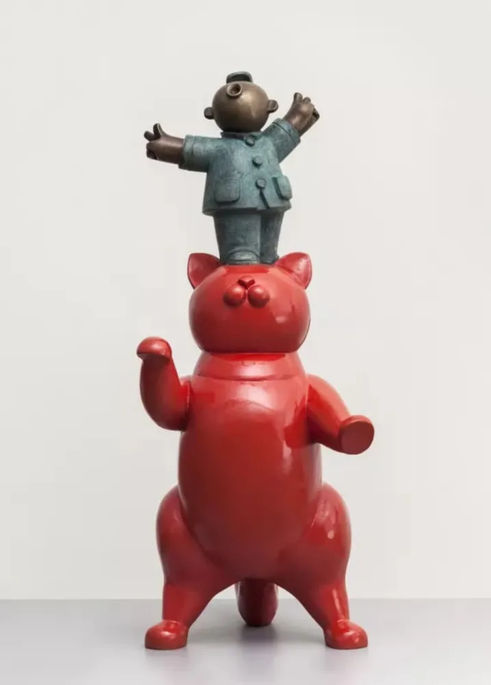 maneki-neko or "lucky cat", Japanese figurine cat usually found at the entrance of shops, restaurants and bars